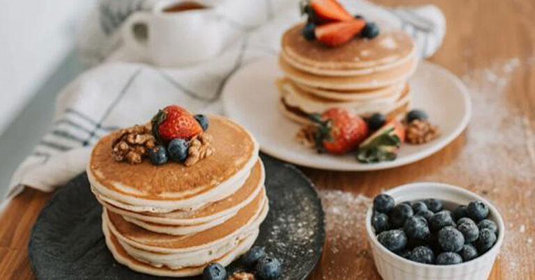 gluten free pancakes with strawberries and blueberries